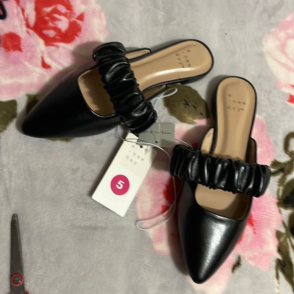 Lovely black slip on flats